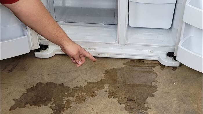 what causes a refrigerator to leak water
